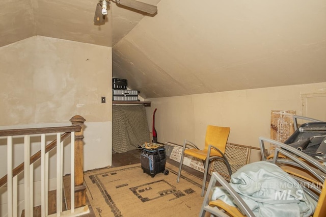 bonus room with vaulted ceiling and ceiling fan