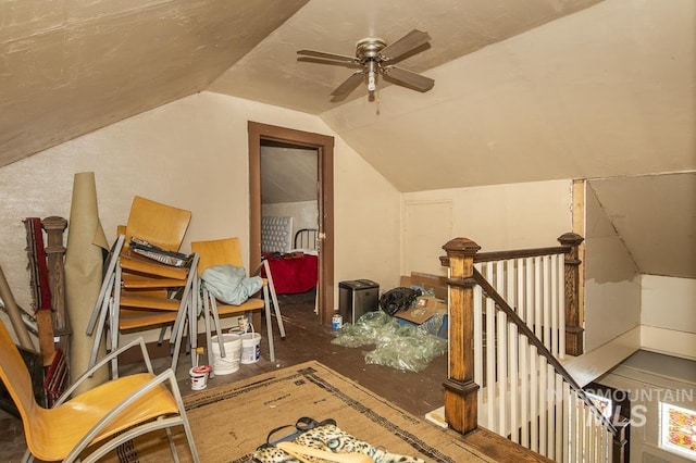 bonus room with lofted ceiling and ceiling fan