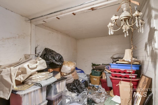 miscellaneous room featuring a notable chandelier