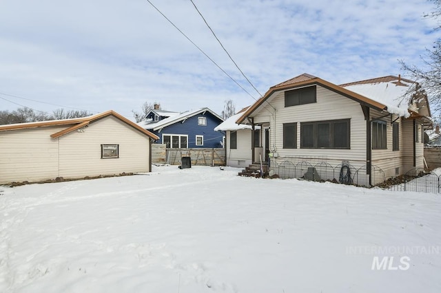 view of snow covered property