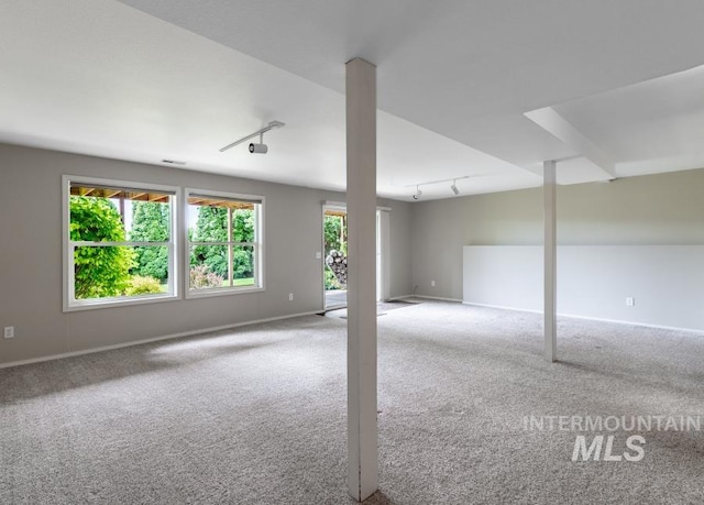 943 Colt Rd, Moscow, ID 83843 - carpeted spare room with track lighting and baseboards