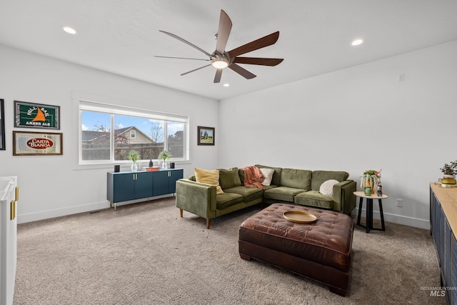 living area with recessed lighting, baseboards, a ceiling fan, and carpet floors
