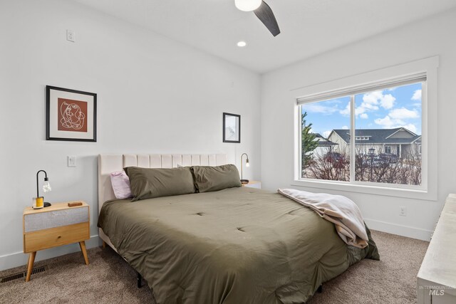 carpeted bedroom with recessed lighting, visible vents, baseboards, and ceiling fan