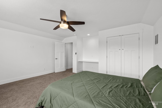 bedroom featuring visible vents, baseboards, ceiling fan, lofted ceiling, and carpet flooring