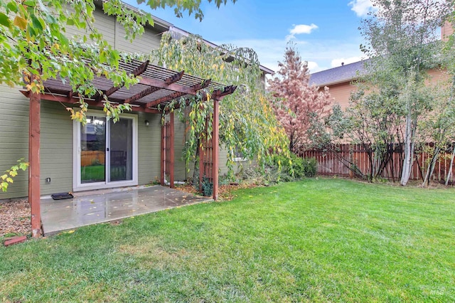 view of yard with a pergola and a patio area