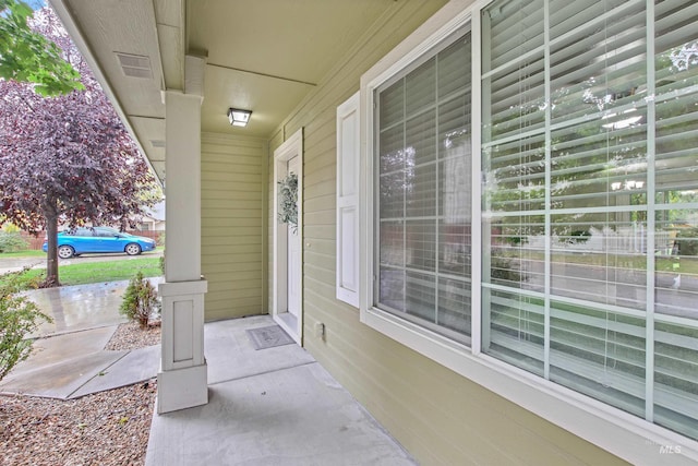 view of patio featuring a porch