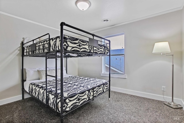 carpeted bedroom featuring ornamental molding