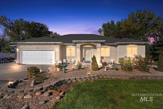 view of front of property featuring a garage