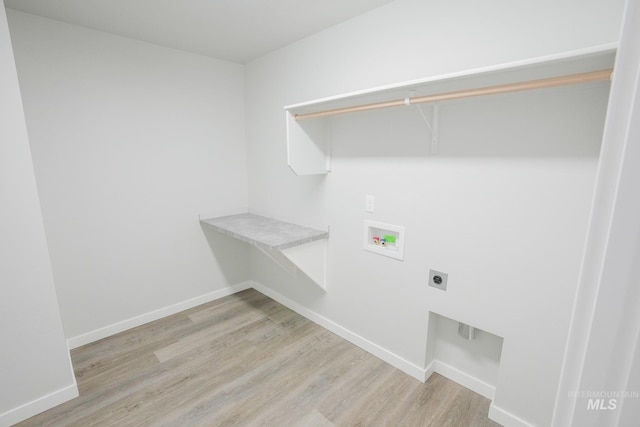 6073 W Mikonos St, Meridian, ID 83646 - washroom featuring electric dryer hookup, washer hookup, light wood-style flooring, and baseboards