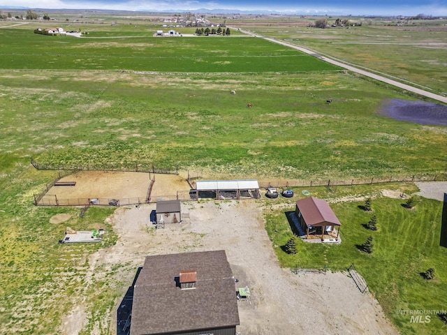 birds eye view of property featuring a rural view