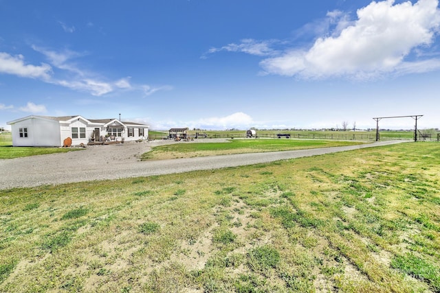 view of yard featuring a rural view