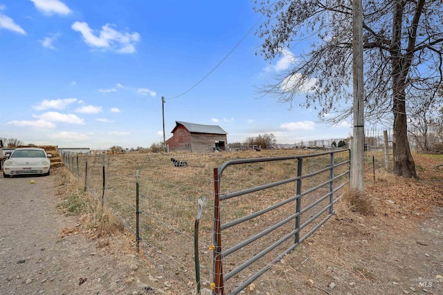 view of gate featuring a rural view