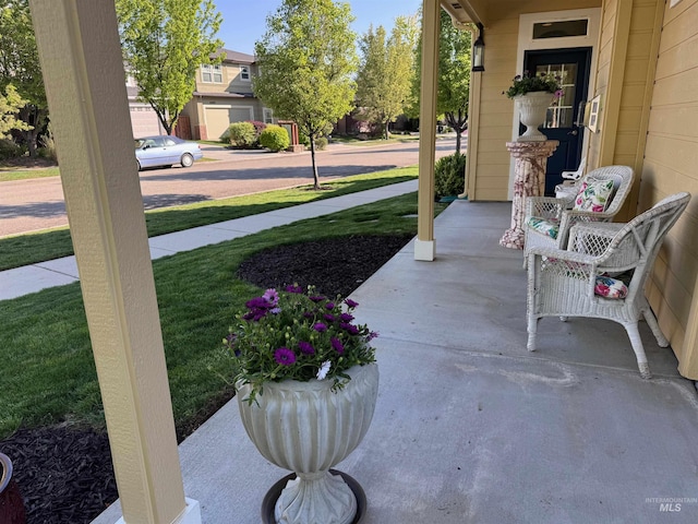 view of patio featuring a porch