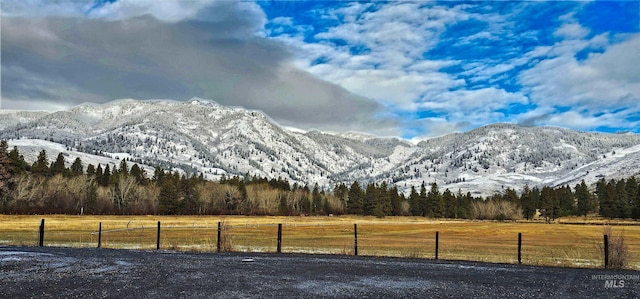 view of mountain feature with a rural view