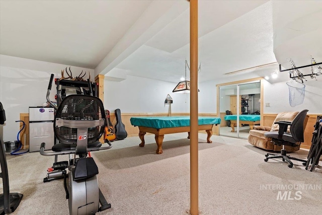 game room featuring carpet flooring, pool table, and a wainscoted wall