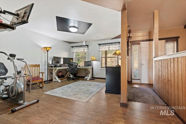 office featuring wood finished floors and baseboards