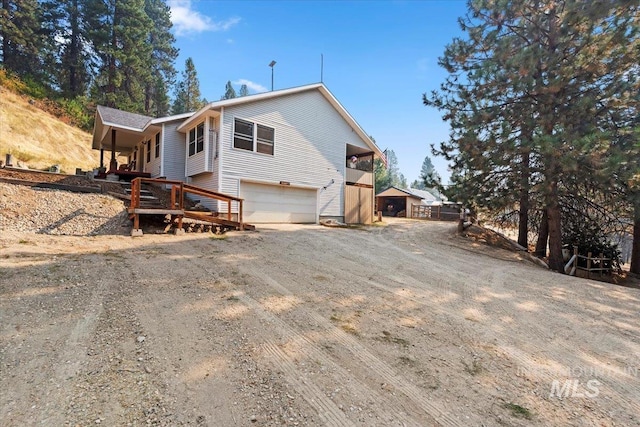 exterior space with an attached garage and driveway
