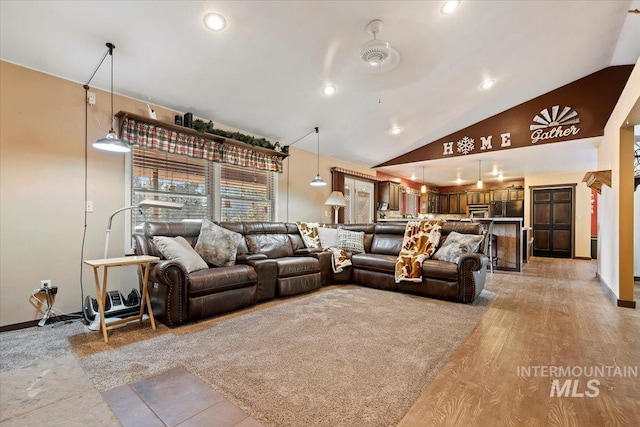 living area featuring lofted ceiling, a ceiling fan, baseboards, and recessed lighting