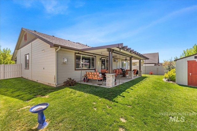 back of property with a storage shed, a patio, and an outdoor structure