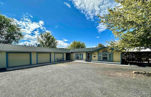 single story home featuring a garage