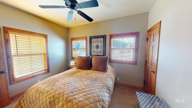 bedroom featuring ceiling fan and carpet floors