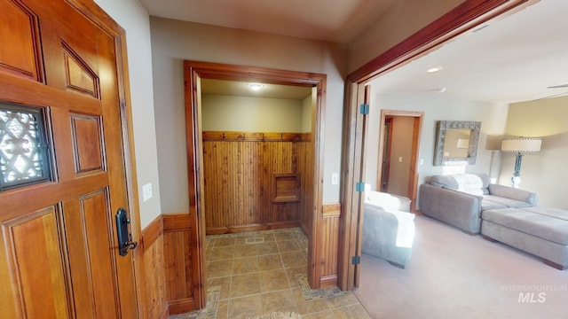 hallway with wooden walls