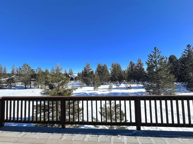 view of snow covered deck