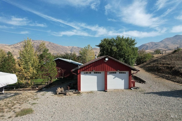 detached garage with a mountain view