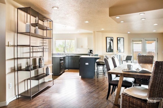 8600 W Brookside Ln, Boise, ID 83714 - dining room with a textured ceiling, dark wood-style flooring, and recessed lighting