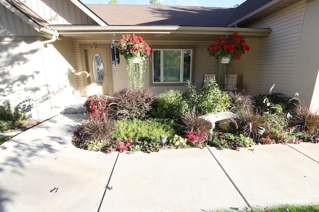 810 Pine St, Filer, ID 83328 - entrance to property with board and batten siding, covered porch, and roof with shingles