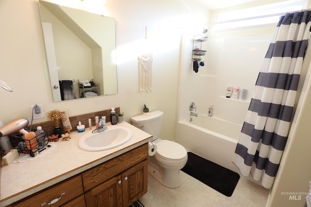 810 Pine St, Filer, ID 83328 - full bath with vanity, toilet, decorative backsplash, and shower / bath combo with shower curtain