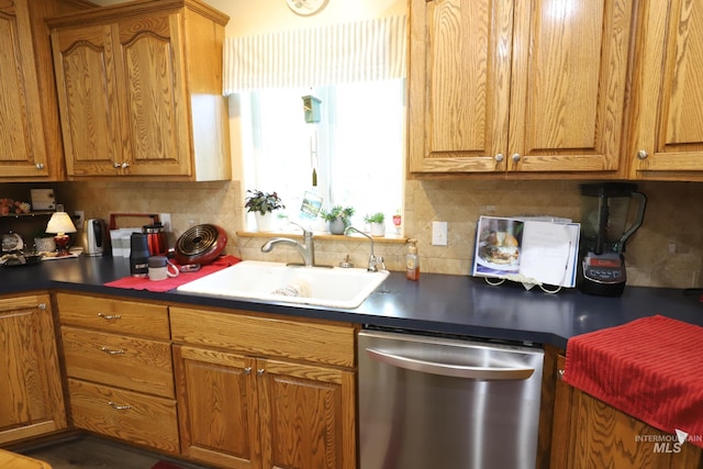 810 Pine St, Filer, ID 83328 - kitchen with dishwasher, a sink, backsplash, and dark countertops