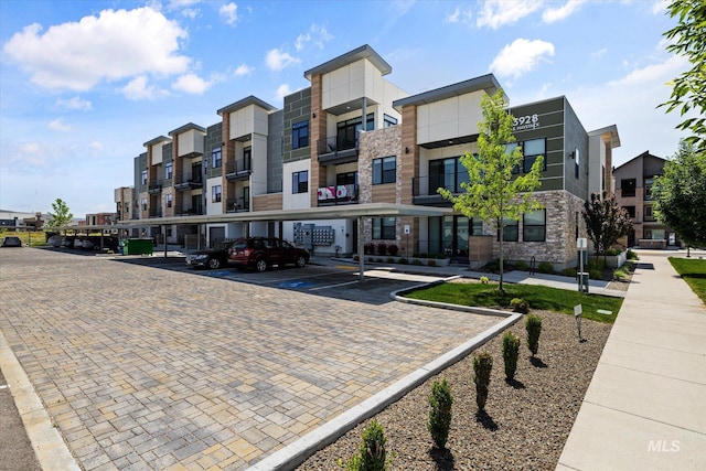3928 E Haystack St Unit 2-208, Boise, ID 83716 - view of property with covered parking