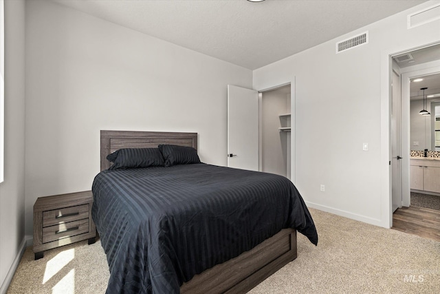 3928 E Haystack St Unit 2-208, Boise, ID 83716 - bedroom with baseboards and carpet flooring