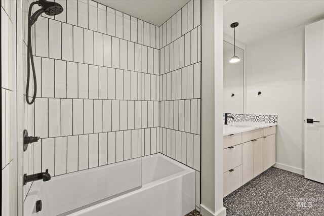 3928 E Haystack St Unit 2-208, Boise, ID 83716 - full bath featuring vanity, baseboards, and bathtub / shower combination