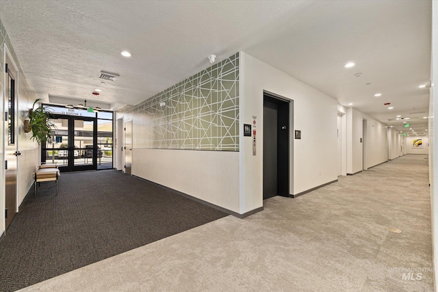 3928 E Haystack St Unit 2-208, Boise, ID 83716 - building lobby featuring recessed lighting and a textured ceiling