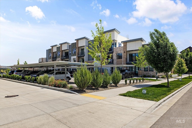 3928 E Haystack St Unit 2-208, Boise, ID 83716 - view of property with covered parking