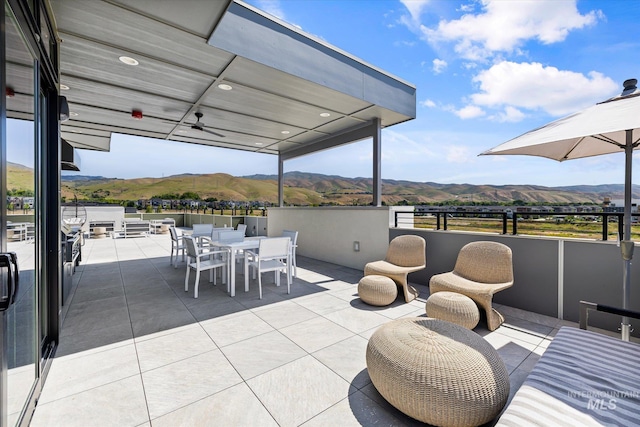 3928 E Haystack St Unit 2-208, Boise, ID 83716 - view of patio featuring a mountain view and outdoor dining area