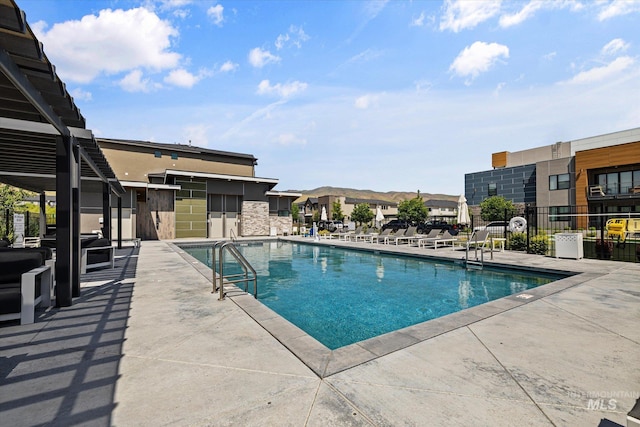 3928 E Haystack St Unit 2-208, Boise, ID 83716 - community pool with a patio
