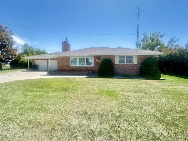 1403 W 16th St, Burley, ID 83318 - view of front facade featuring brick siding, a chimney, a garage, a front yard, and concrete driveway