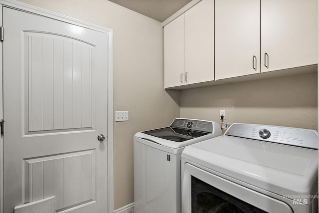 3401 S Murlo Way, Meridian, ID 83642 - laundry room featuring washer and dryer and cabinet space