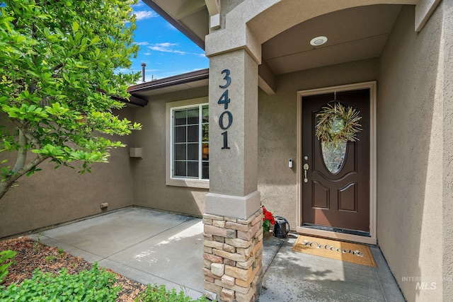 3401 S Murlo Way, Meridian, ID 83642 - property entrance featuring stucco siding
