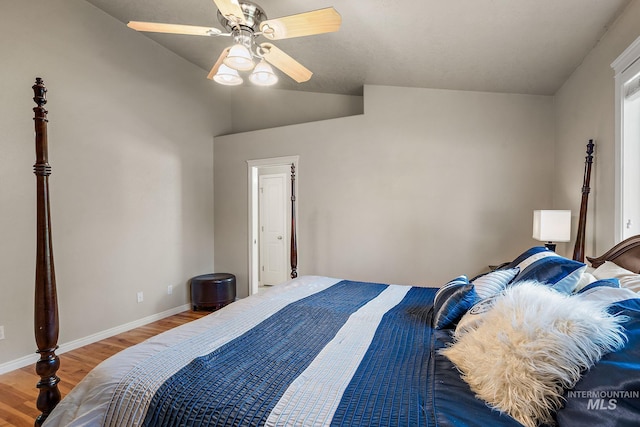 3401 S Murlo Way, Meridian, ID 83642 - bedroom featuring wood finished floors, baseboards, a ceiling fan, and lofted ceiling