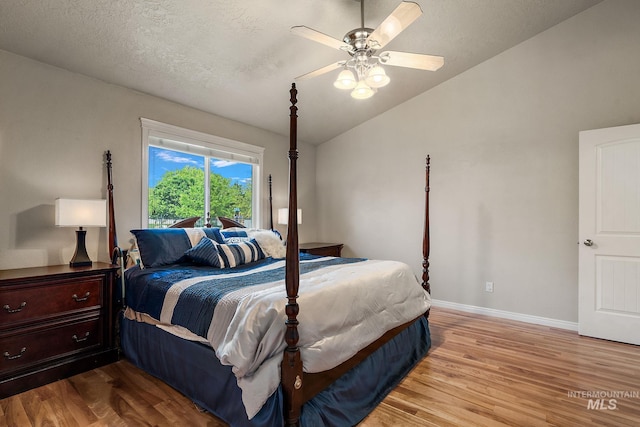 3401 S Murlo Way, Meridian, ID 83642 - bedroom with wood finished floors, baseboards, lofted ceiling, and ceiling fan