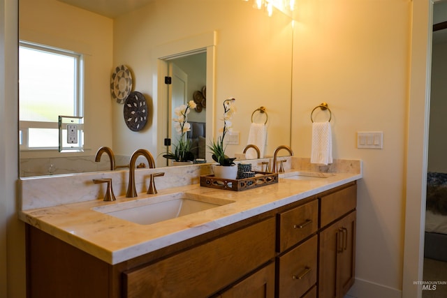 1038 E Fleetwood Ct, Boise, ID 83706 - bathroom with double vanity and a sink