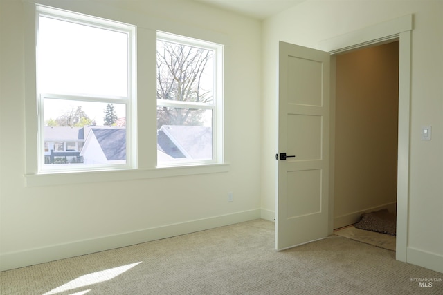 1038 E Fleetwood Ct, Boise, ID 83706 - unfurnished bedroom featuring carpet flooring, baseboards, and multiple windows