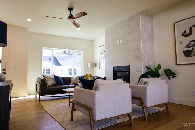 1038 E Fleetwood Ct, Boise, ID 83706 - living room with baseboards, recessed lighting, a ceiling fan, wood finished floors, and a fireplace