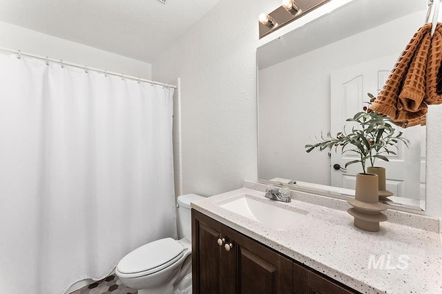 1545 N Ellington Way, Eagle, ID 83616 - full bathroom featuring toilet, vanity, and curtained shower