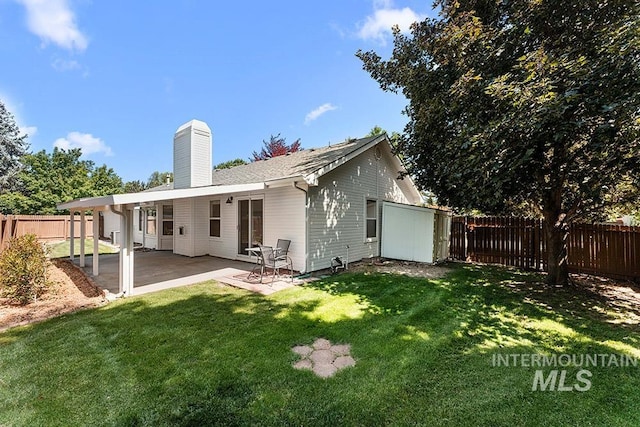 1545 N Ellington Way, Eagle, ID 83616 - rear view of property featuring a patio and a chimney