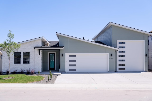 6200 S Binky Ave, Meridian, ID 83642 - contemporary house featuring a garage and driveway